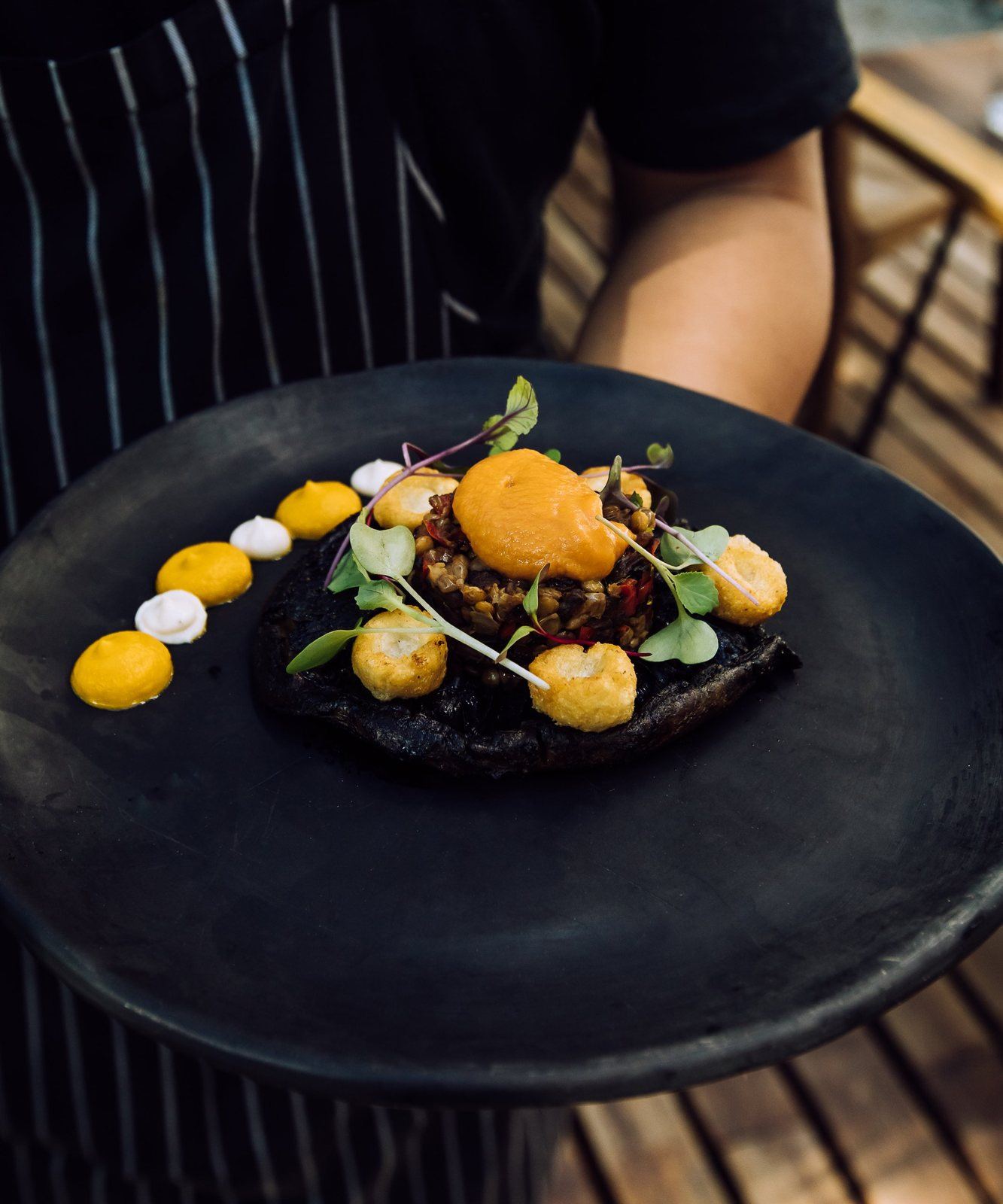 A plated dish leaving the kitchen