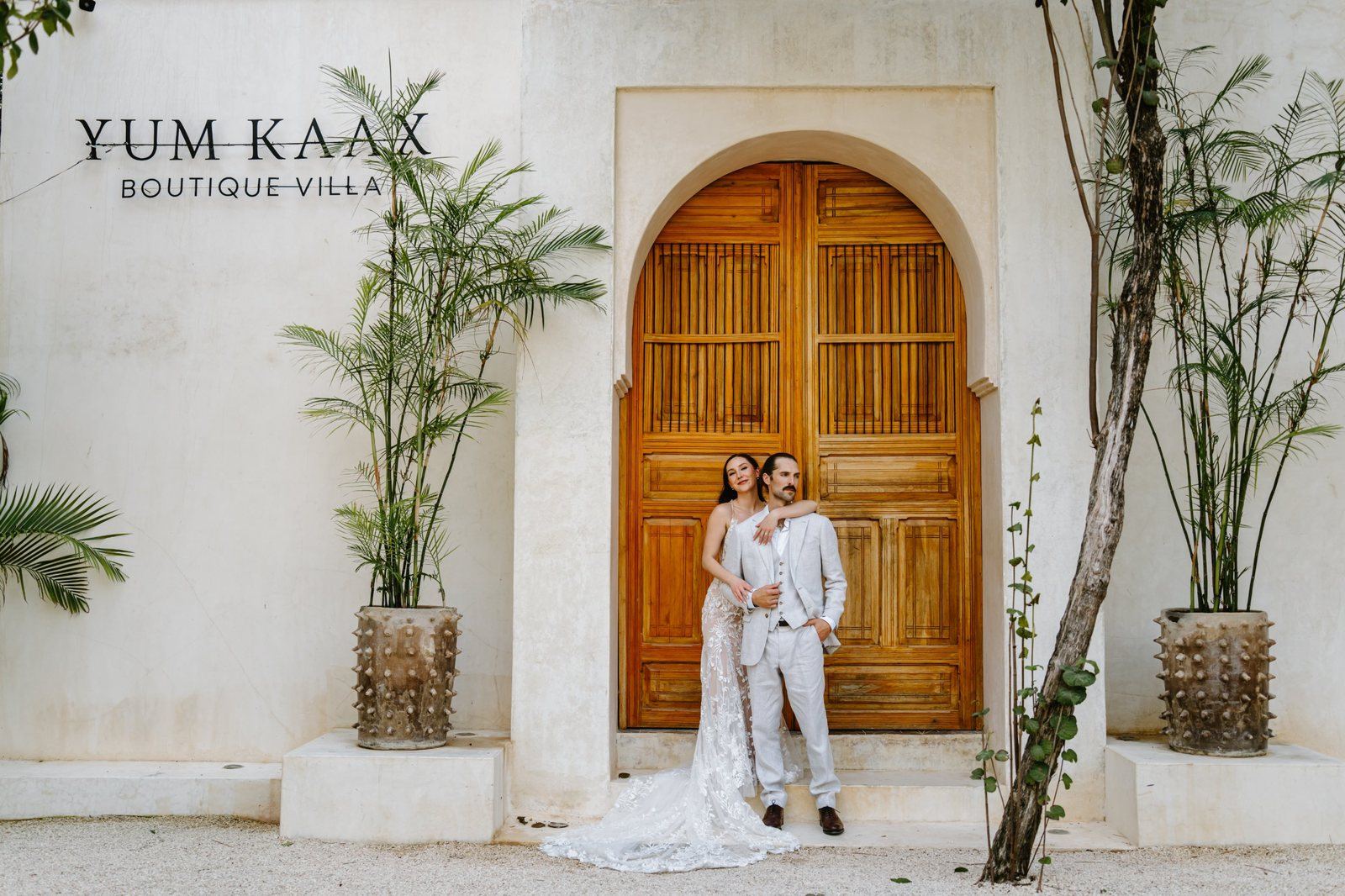 The couple at the main door of Yum Kaax