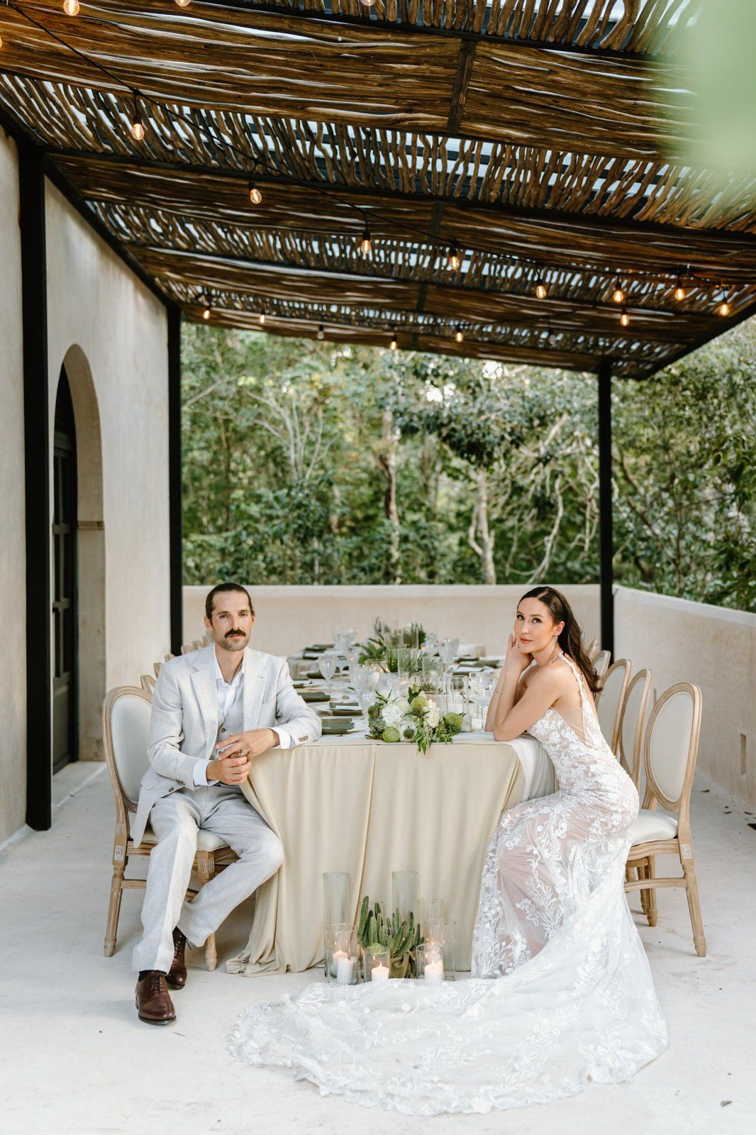 The couple at the head of the long table